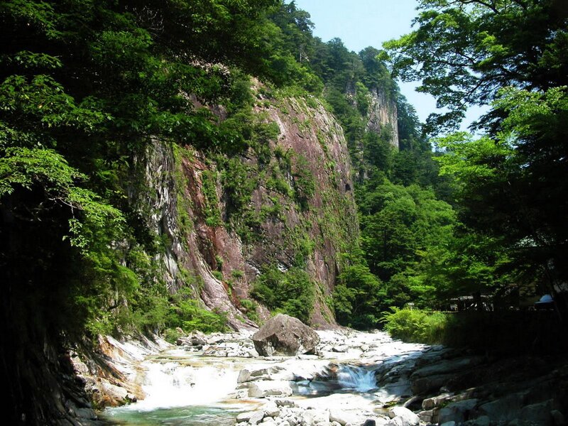 River Flowing Through Canyon — Green, Serene, Afternoon, Photograph, Rocks, Trees