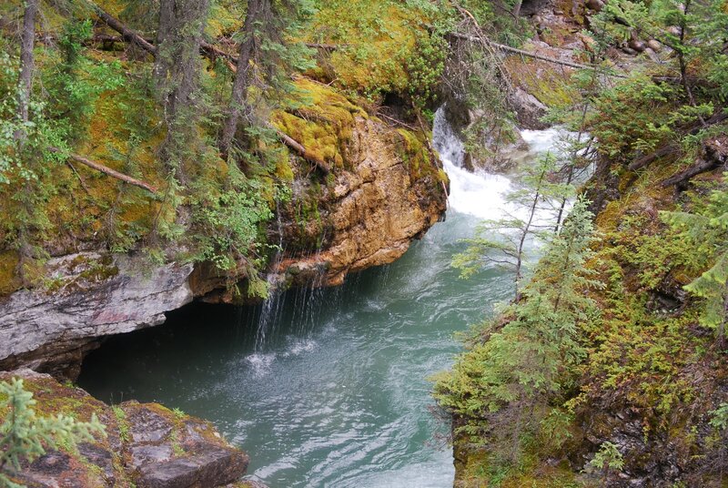 River Flowing Through Canyon — Green, Serene, Photograph, Trees, Rocks