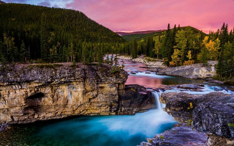 River Flowing Through Canyon — Pink