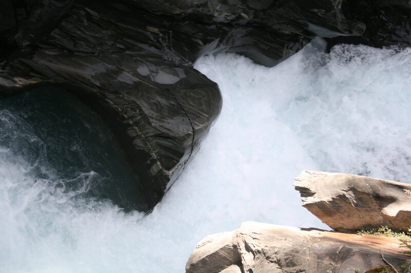 River Flowing Through Canyon — White