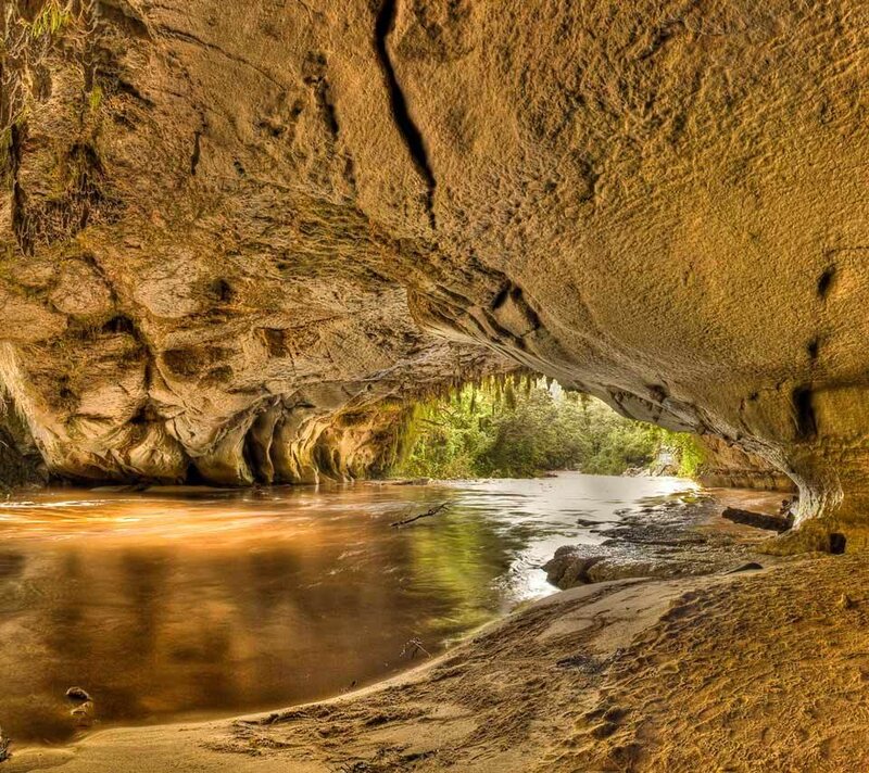River Flowing Through Cave — Brown, Serene