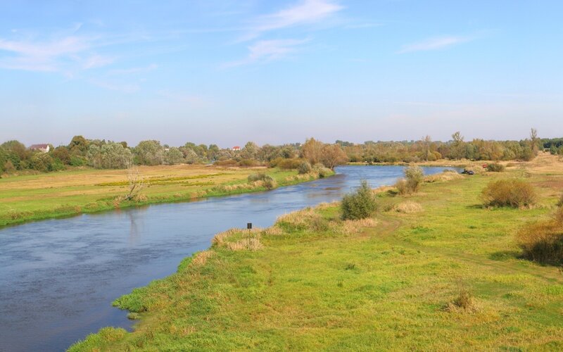 River Flowing Through Fields — Blue
