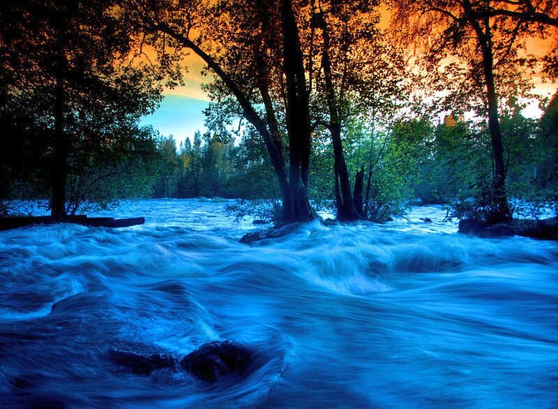 River Flowing Through Forest — Blue, Dramatic, Sunset