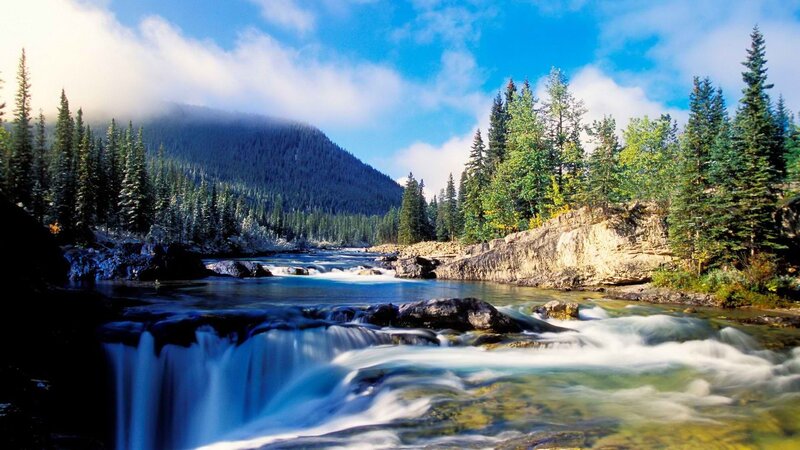 River Flowing Through Forest — Blue, Serene, Afternoon, Photograph, Mountain, Trees, Rocks, Green