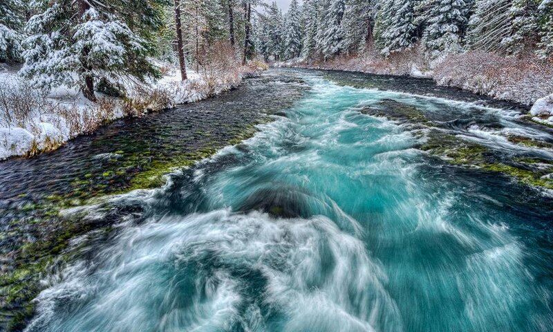 River Flowing Through Forest — Blue, Serene, Winter, Photograph, Snow, Trees, Rocks