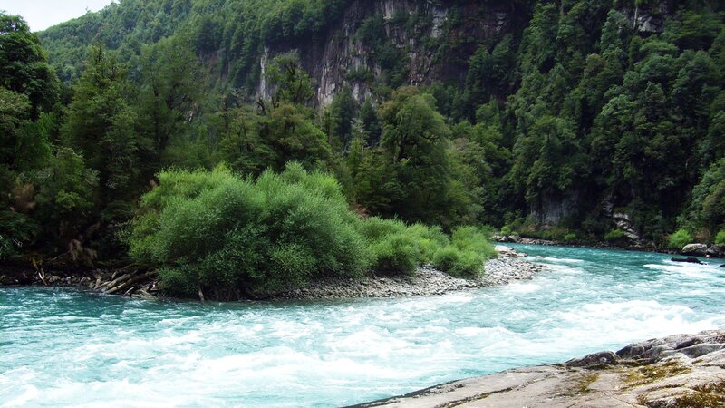 River Flowing Through Forest — Green, Natural, Afternoon, Photograph, Trees, Rocks, Mountain