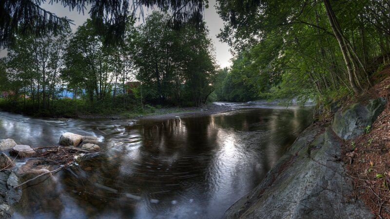 River Flowing Through Forest — Green, Serene, Sunset, Photograph, Trees, Rocks