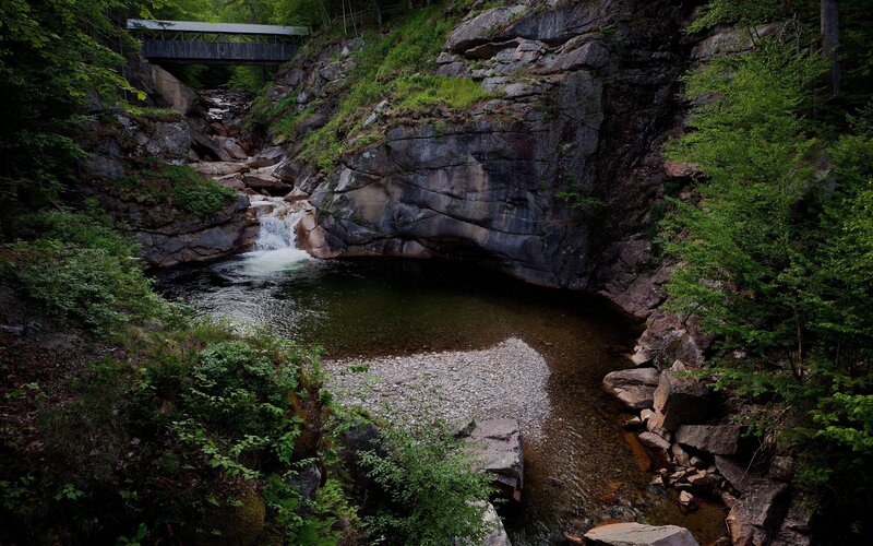 River Flowing Through Gorge