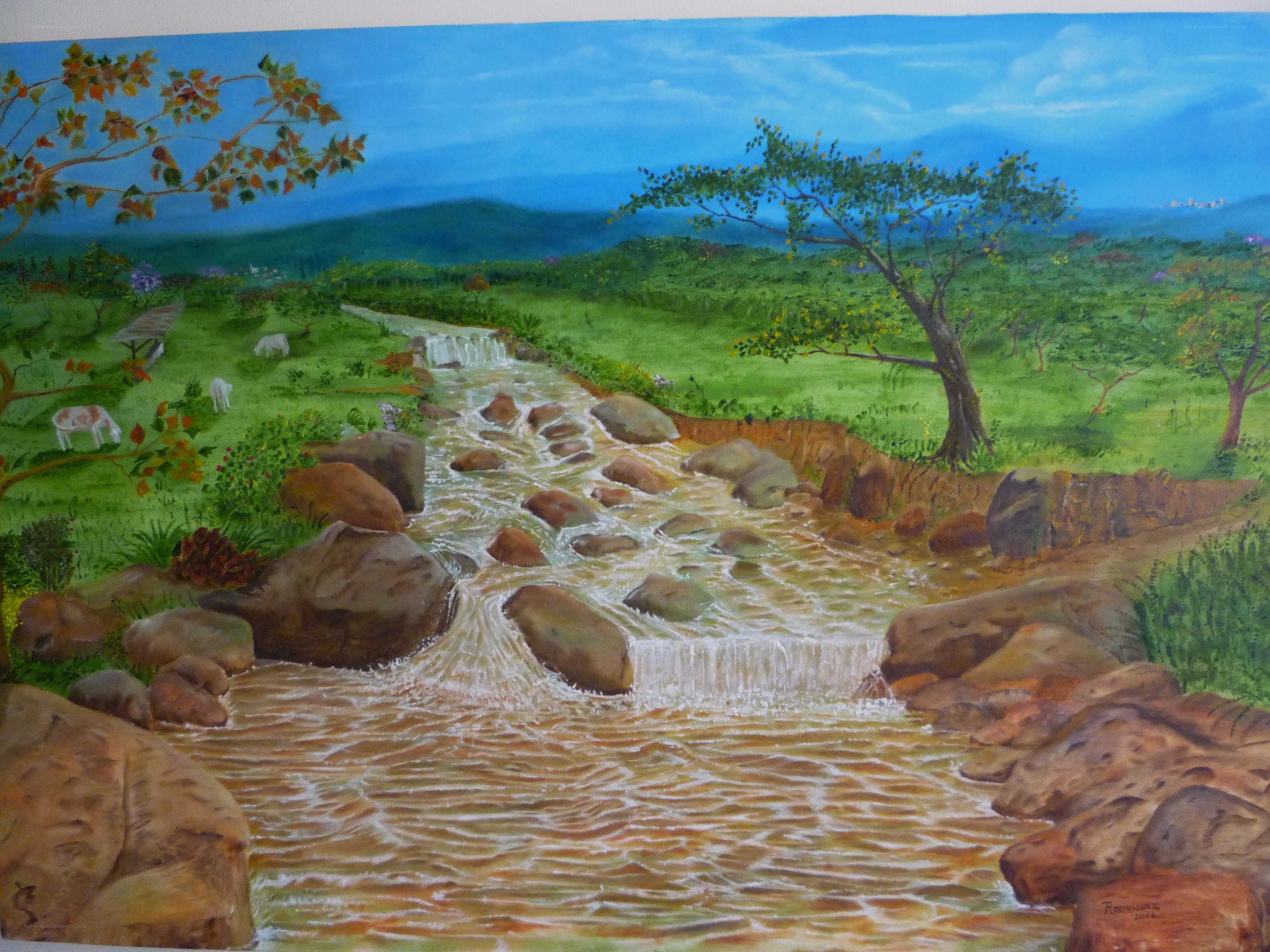 River flowing through green valley