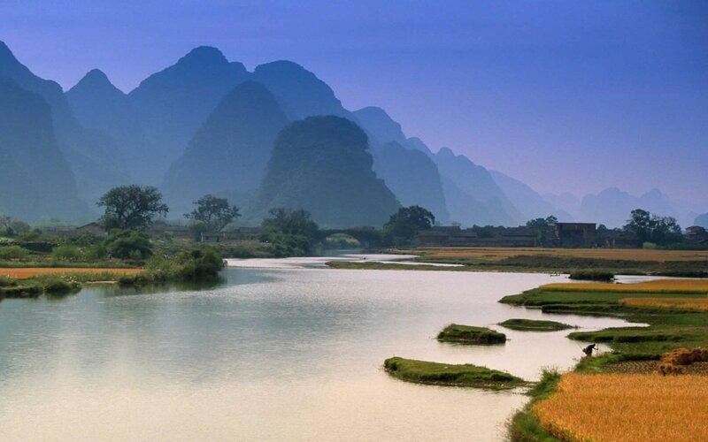 River Flowing Through Karst Mountains — Blue, Serene