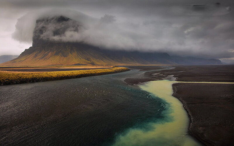 River Flowing Through Landscape