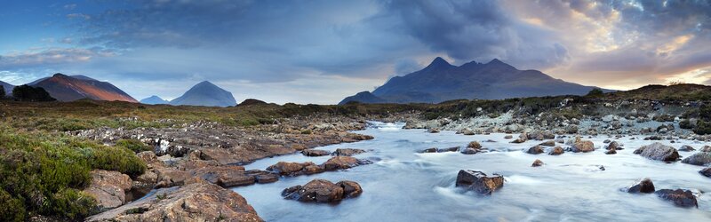 River flowing through mountain landscape