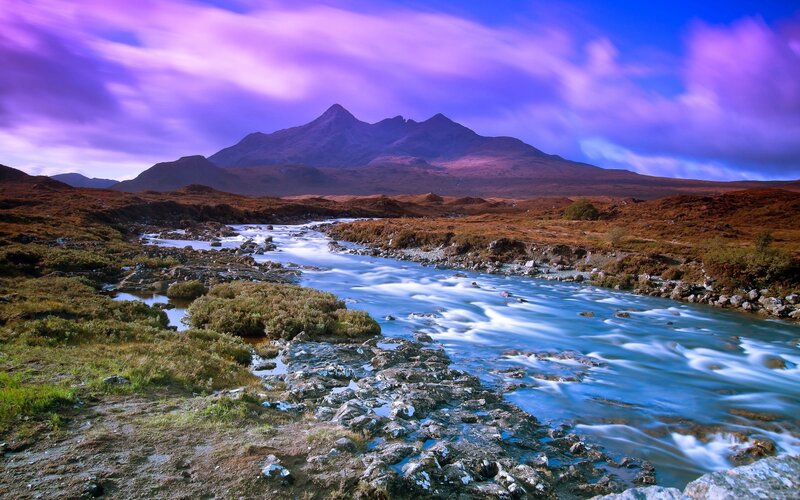 River flowing through mountain landscape