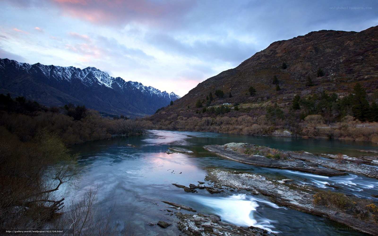 river flowing through mountain valley