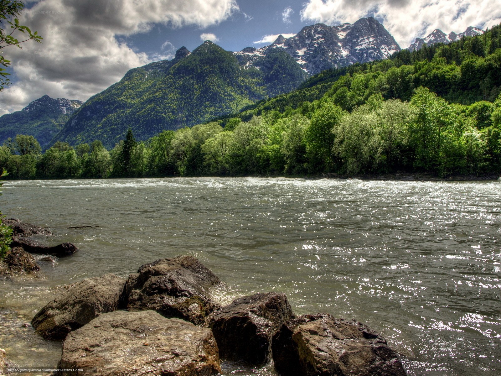 river flowing through mountain valley