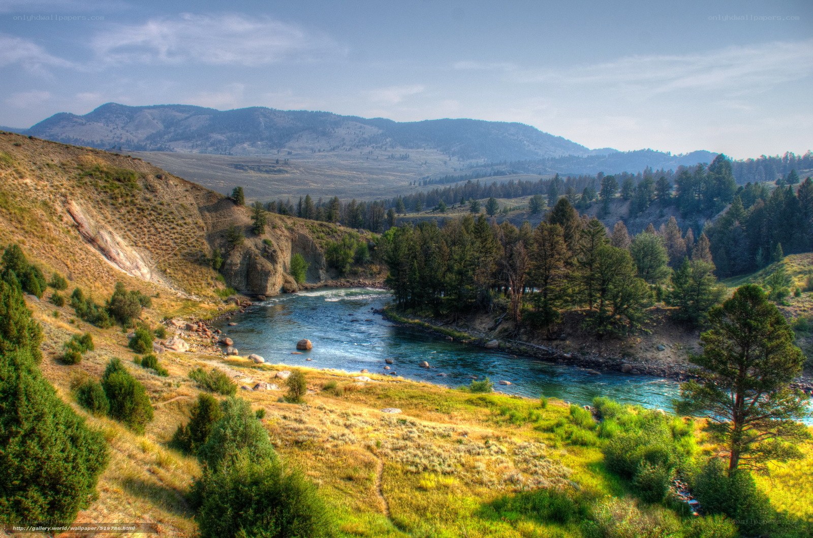 river flowing through mountain valley