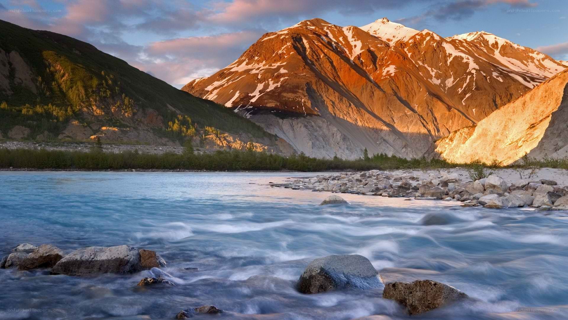 river flowing through mountain valley