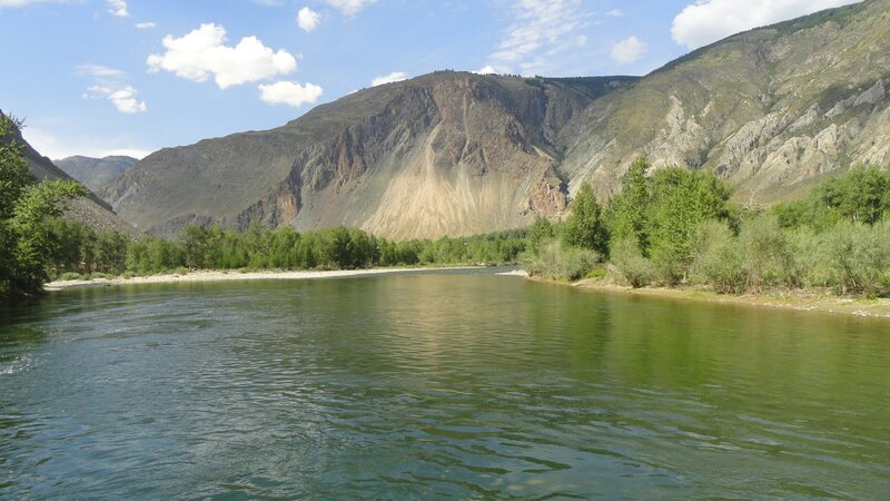 river flowing through mountain valley