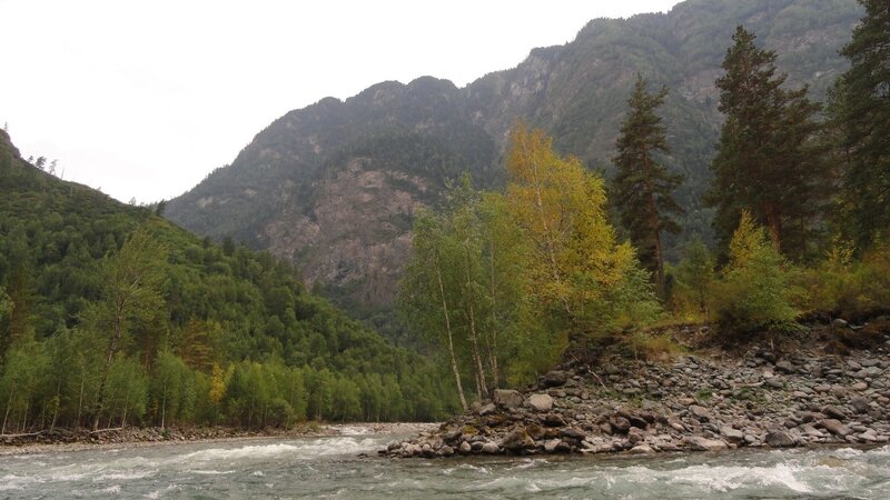 river flowing through mountain valley