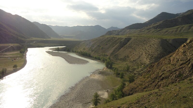river flowing through mountain valley