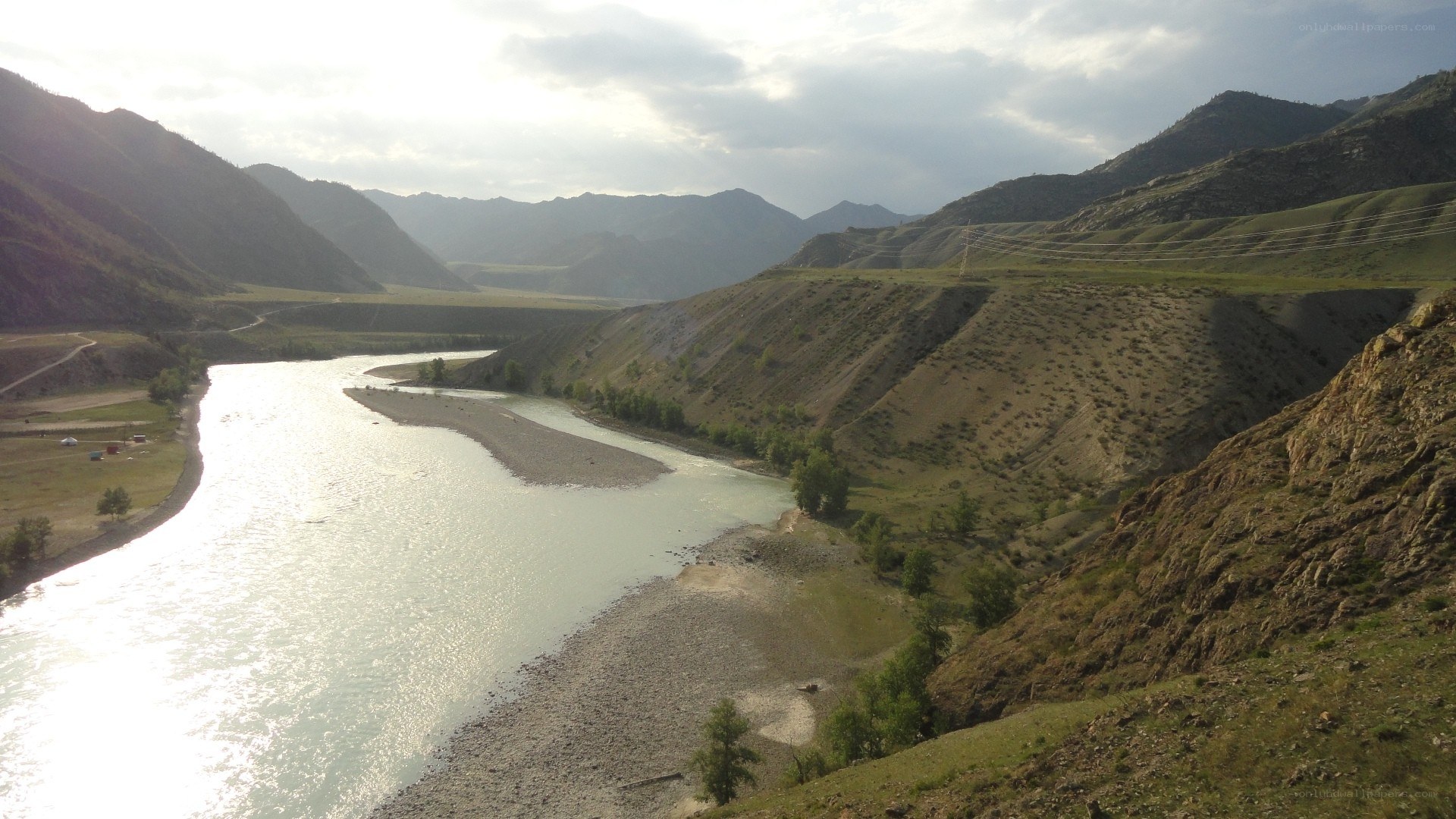 river flowing through mountain valley
