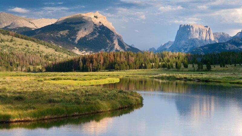 river flowing through mountain valley