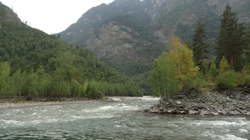 river flowing through mountain valley