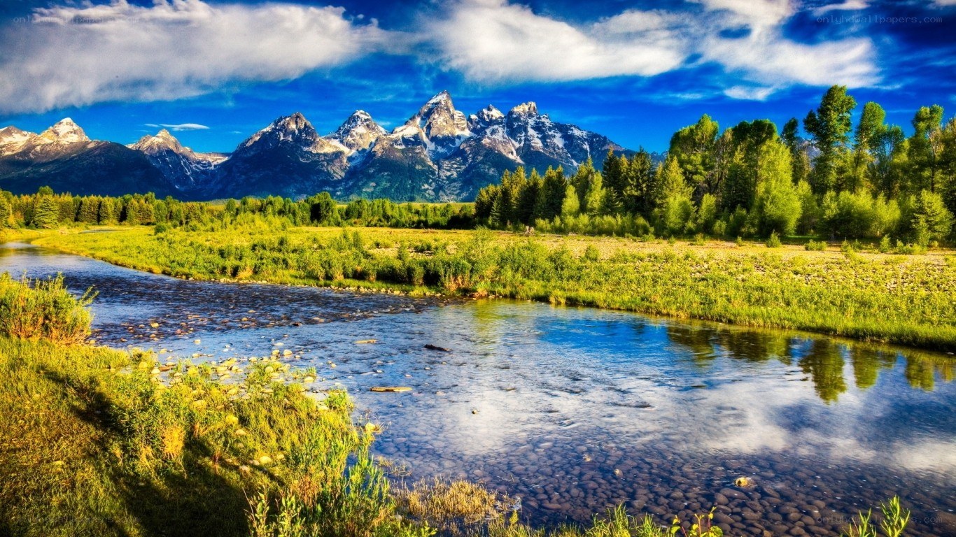 river flowing through mountain valley