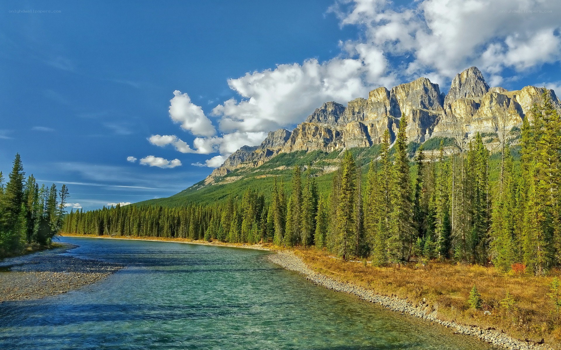 river flowing through mountain valley