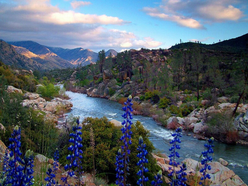 river flowing through mountain valley