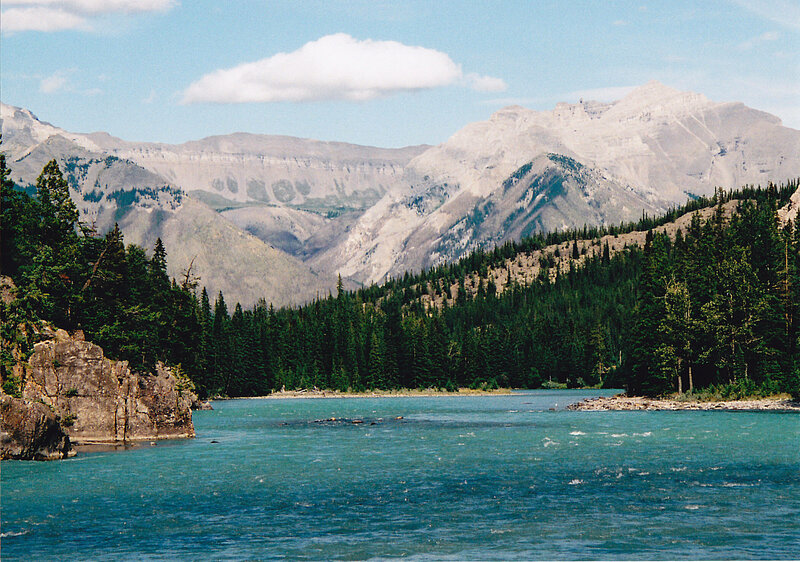 river flowing through mountain valley