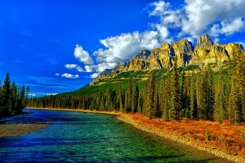 River Flowing Through Mountains — Blue, Dramatic, Afternoon, Photograph, Forest