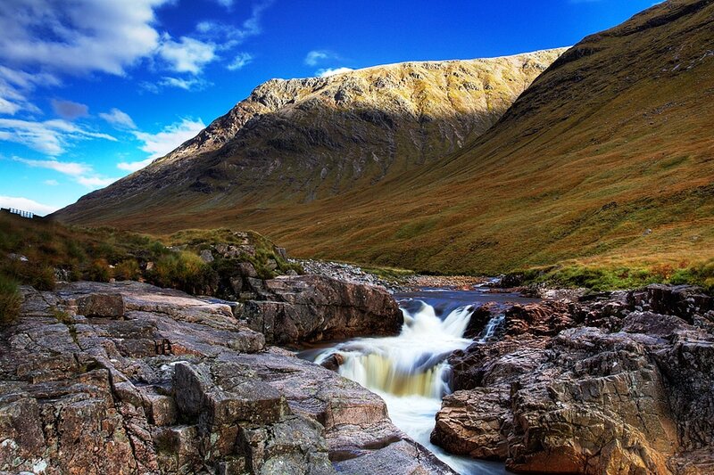 River Flowing Through Mountains — Blue, Dramatic, Afternoon