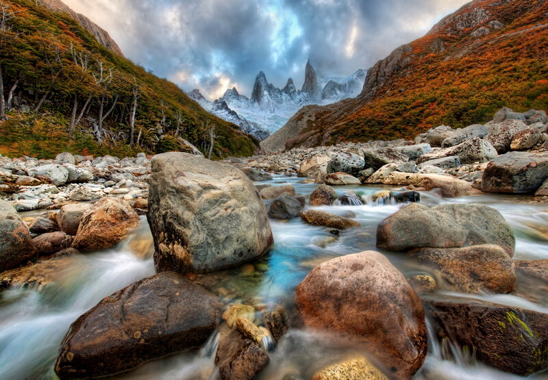 River Flowing Through Mountains — Blue, Dramatic, Autumn, Photograph, Rocks