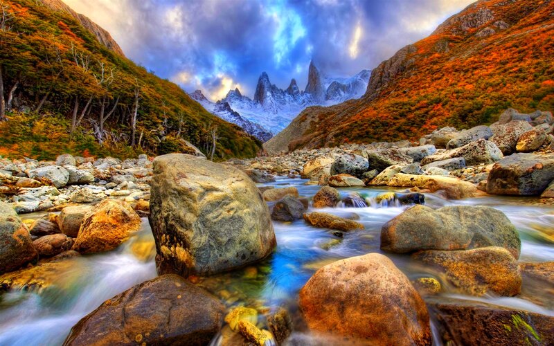 River Flowing Through Mountains — Blue, Dramatic, Autumn, Photograph