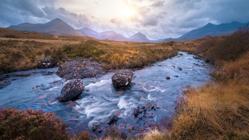 River Flowing Through Mountains — Blue, Dramatic, Sunset, Photograph, Rocks