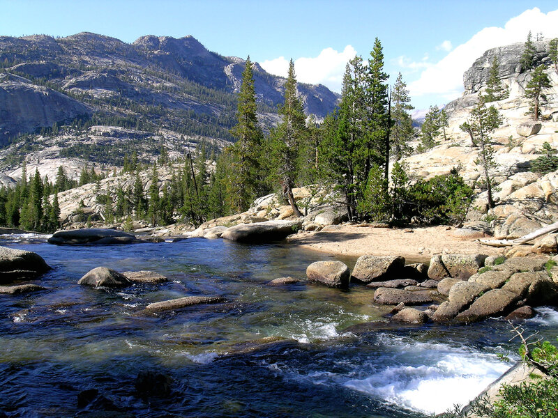 River Flowing Through Mountains — Blue, Serene, Afternoon, Photograph, Trees