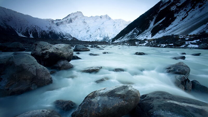 River Flowing Through Mountains — Blue, Serene, Morning, Photograph, Rocks, Snow