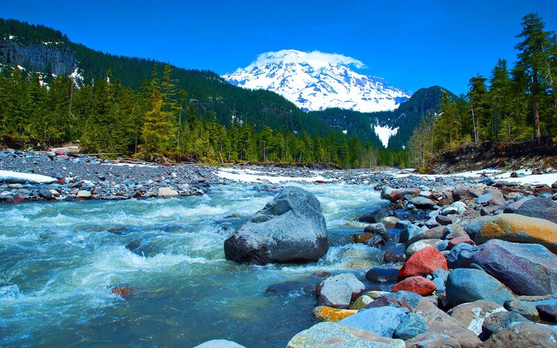 River Flowing Through Mountains — Blue, Serene, Summer, Photograph