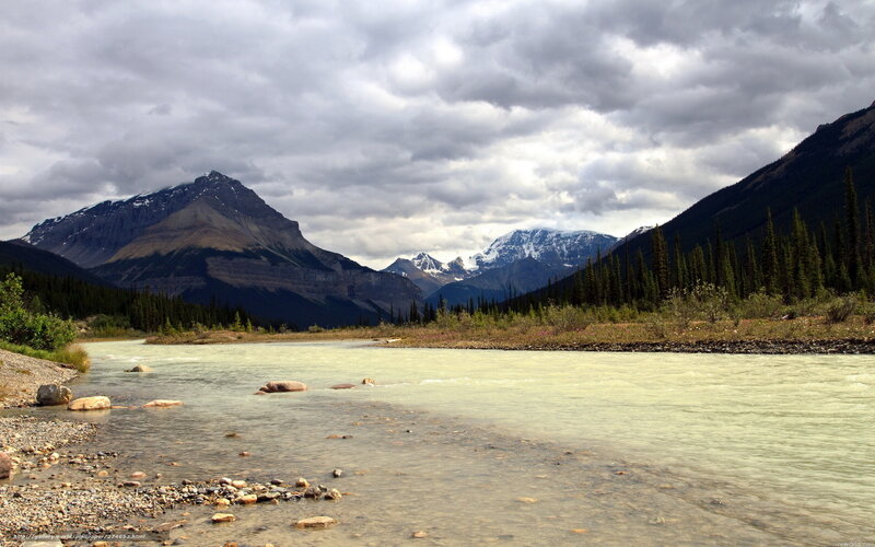 River Flowing Through Mountains — Green, Dramatic, Afternoon