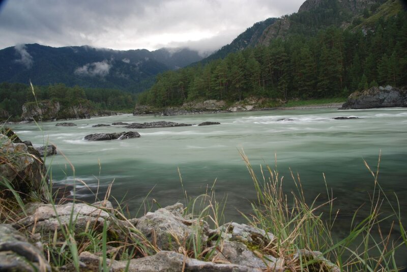 River Flowing Through Mountains — Green