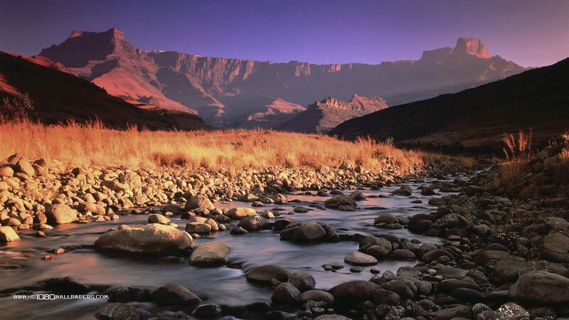 River Flowing Through Mountains — Purple