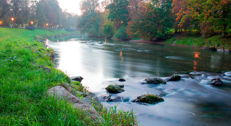 River Flowing Through Park — Green, Serene, Autumn