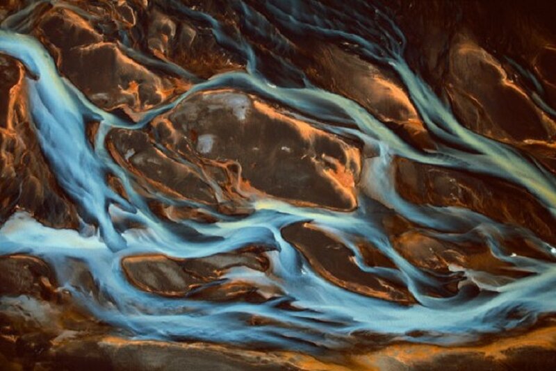 River Flowing Through Rock — Blue