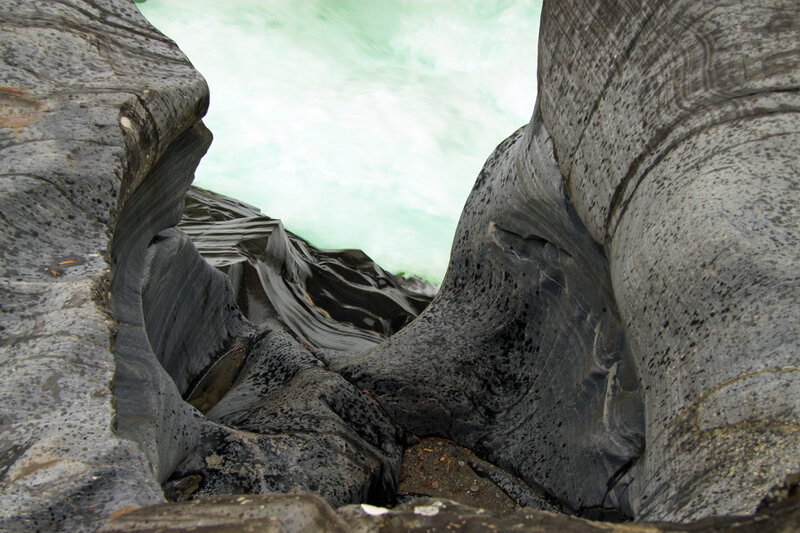 River Flowing Through Rock