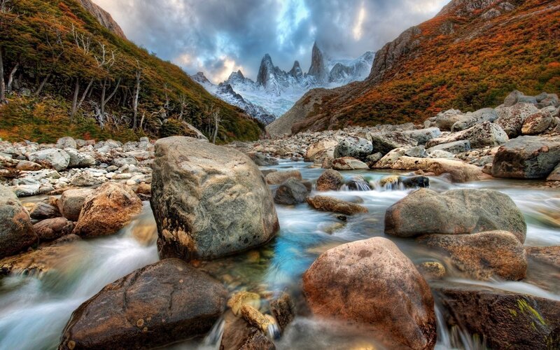 River Flowing Through Rocks — Blue, Dramatic, Autumn, Photograph