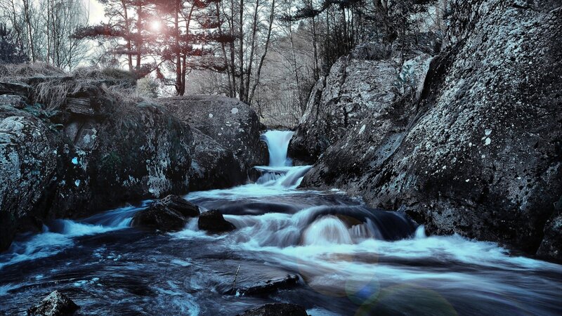 River Flowing Through Rocks — Blue, Dramatic, Sunset