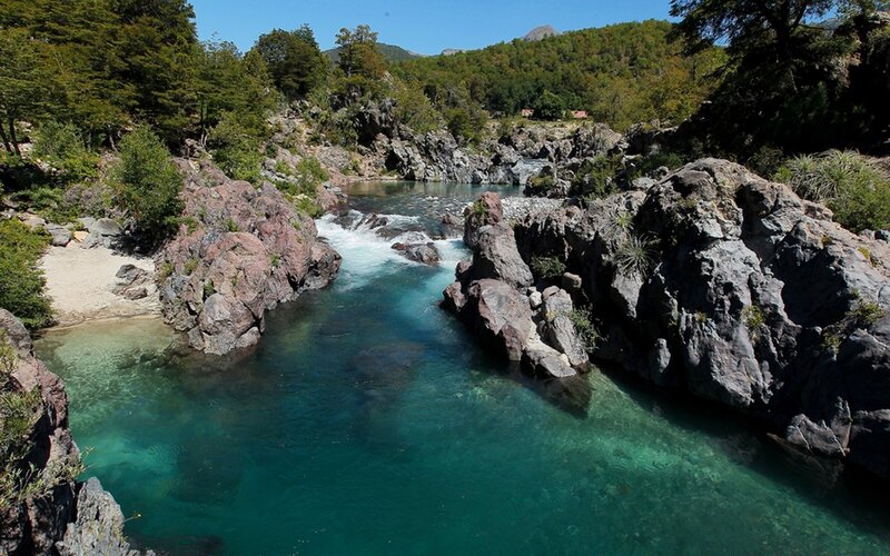 River Flowing Through Rocks — Blue, Serene, Afternoon, Photograph