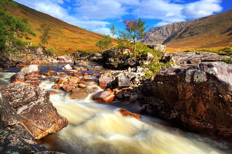 River Flowing Through Rocks — Blue, Serene