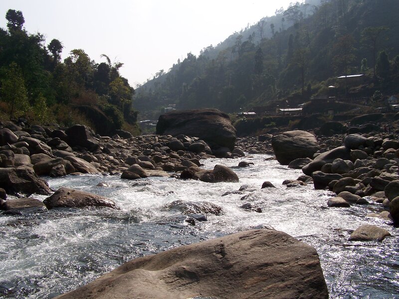 River Flowing Through Rocks — Gray